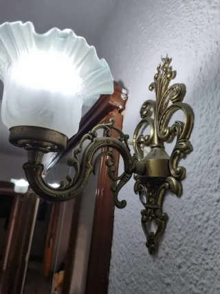 Apliques de pared dorados y transparentes