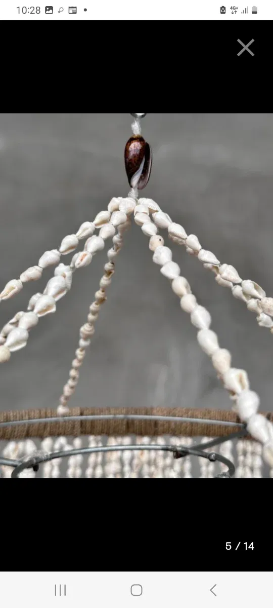 Lámpara artesanal beige y blanca canchas de mar