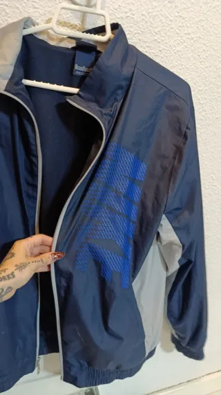 Chaqueta Nike azul y gris 
