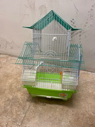 Jaula para pájaros verde y plateada