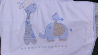 Funda edredón cuna y chichonera.
