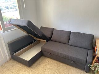 Sofá cama gris con cheslong y canapé