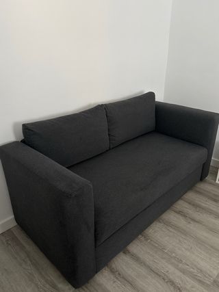 Sofá cama gris de tela