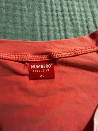 Camiseta Puma rosa y blanca