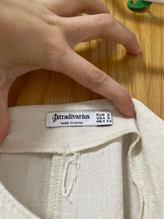 Mono corto pantalón beige Stradivarius Talla s