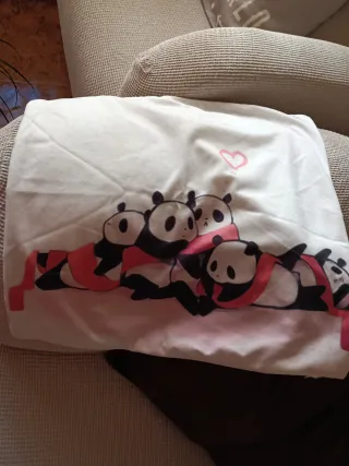 Cojines de tela con diseño de pandas