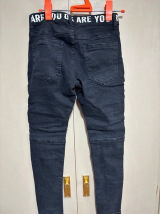 Tejanos negros ELYN.G JEANS rotos chico