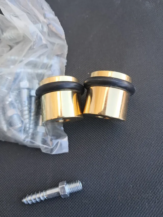 Topes de puerta latón cromado 25x25