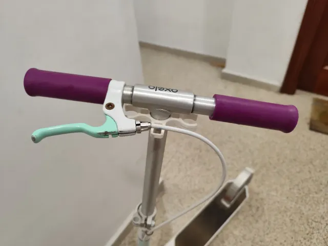 Patinete Oxelo morado y blanco