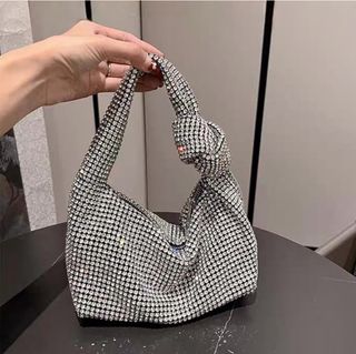 Bolso de mano con pedrería