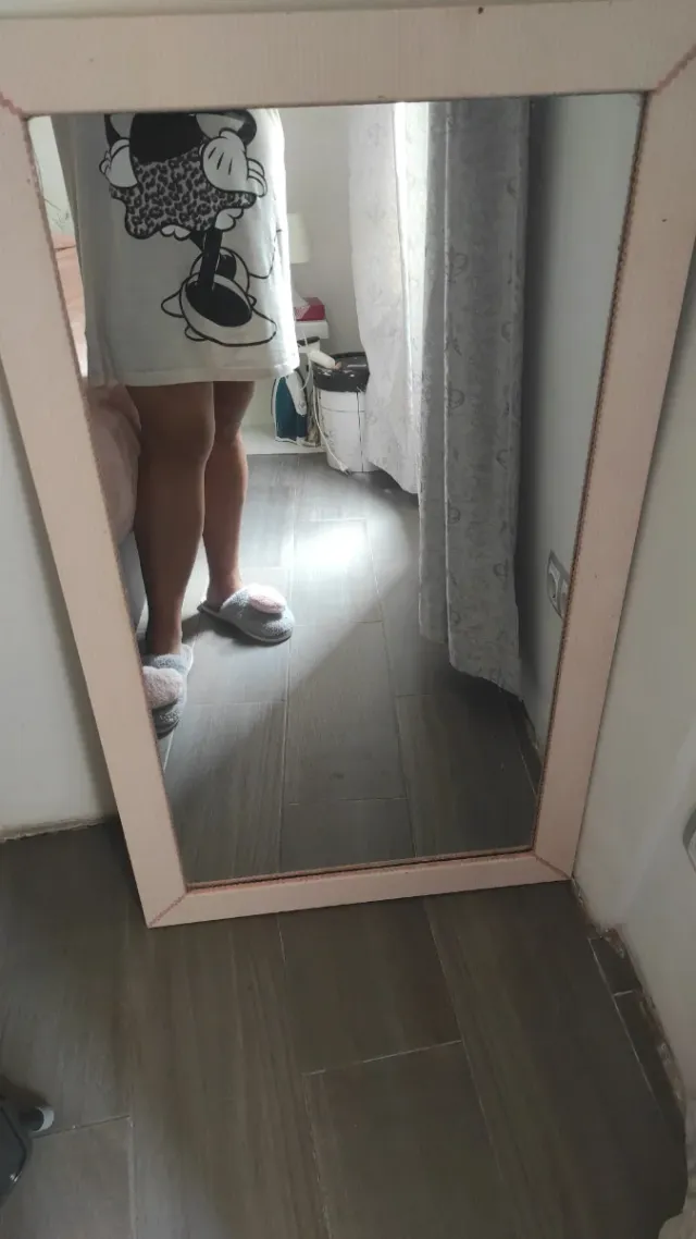 Espejo decorativo ondulado negro y plateado