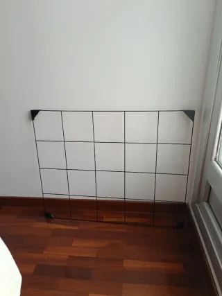 Colgador de pared de metal negro