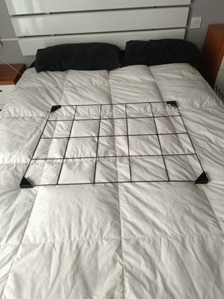 Colgador de pared de metal negro