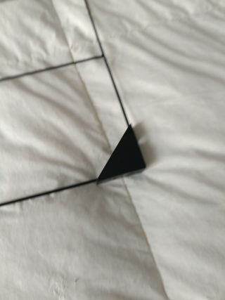 Colgador de pared de metal negro