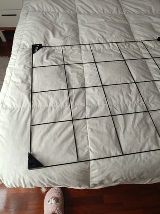 Colgador de pared de metal negro