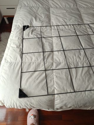 Colgador de pared de metal negro