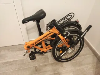 Bicicleta Plegable Naranja con publicada de LEOTRO