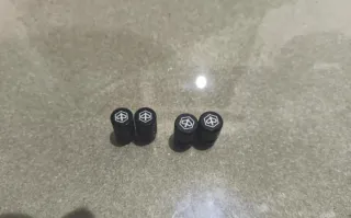 Tapones Piaggio Negros