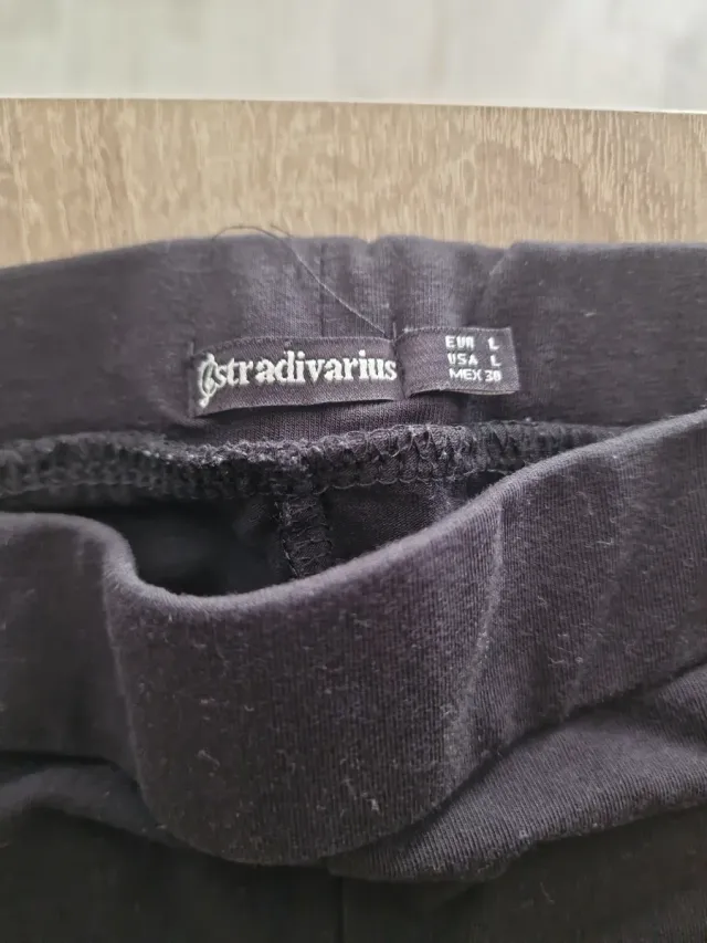 Leggings negros con raya lateral