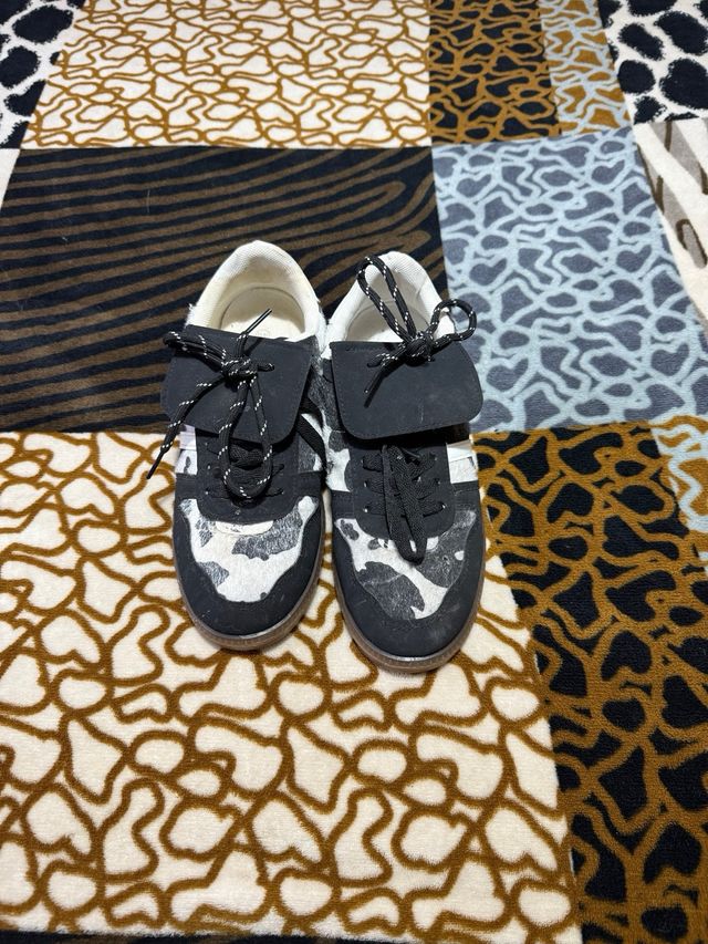 Deportivas pelo vaca