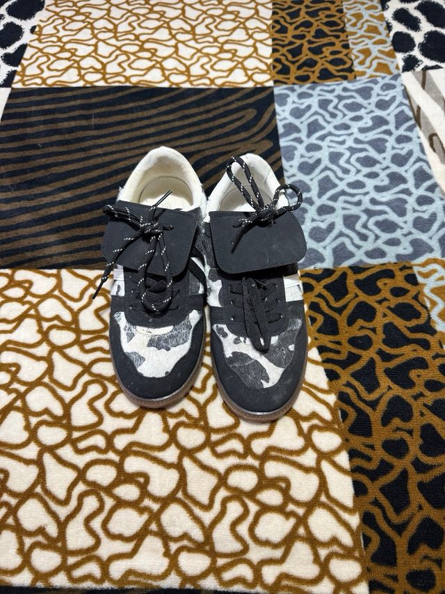 Deportivas pelo vaca