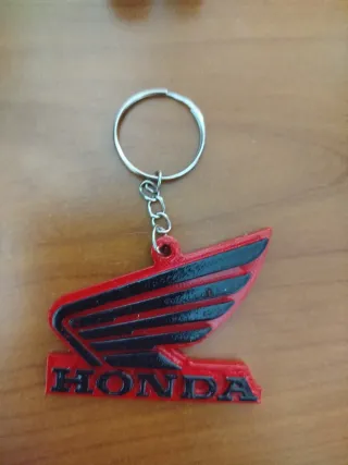 Llavero y tapones HONDA