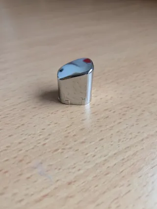 Botón universal freno de mano plateado.