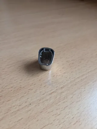 Botón universal freno de mano plateado.