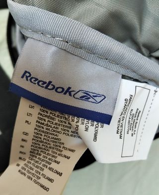 Bolso bandolera Reebok gris y negro