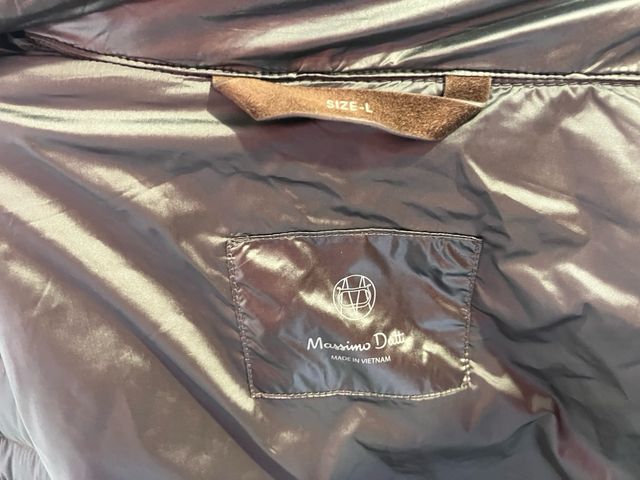 Chaqueta acolchada gris con cremallera