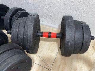 Pesas deporte: discos y barras