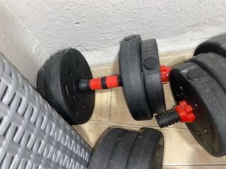 Pesas deporte: discos y barras