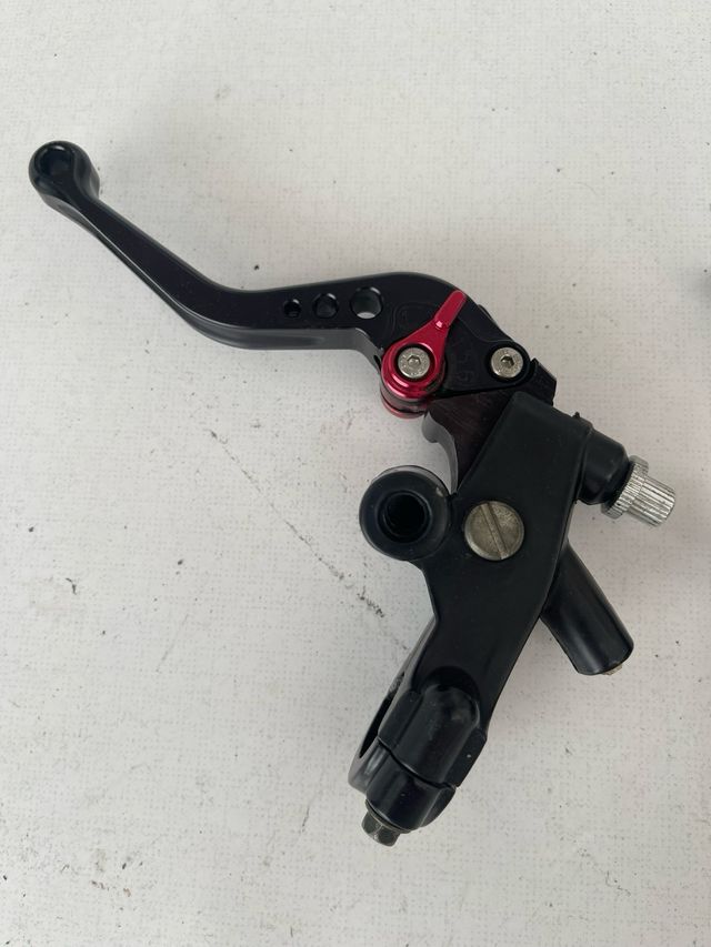 Leve per moto regolabili