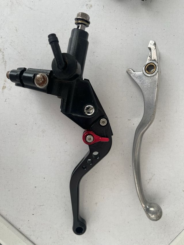 Leve per moto regolabili