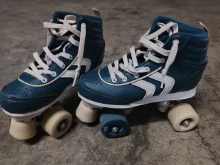 Pattini a rotelle blu taglia 38