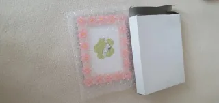 Cornice portafoto decorata con fiori