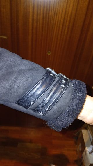 Cazadora ante negro mujer