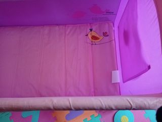 Cuna de viaje rosa