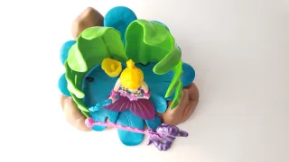 Sirena con trono y caballito de mar