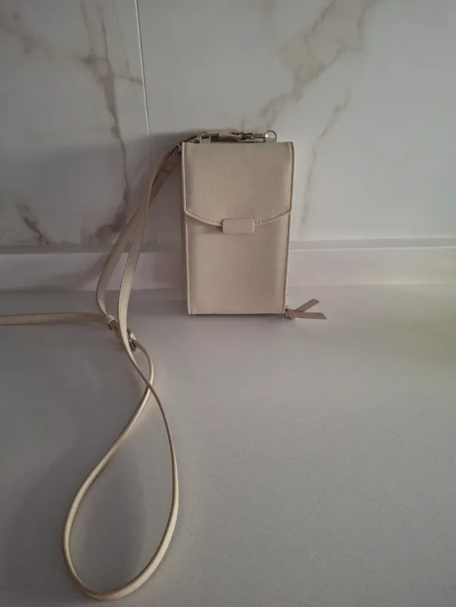 Bolso para móvil Parfois, beige.
