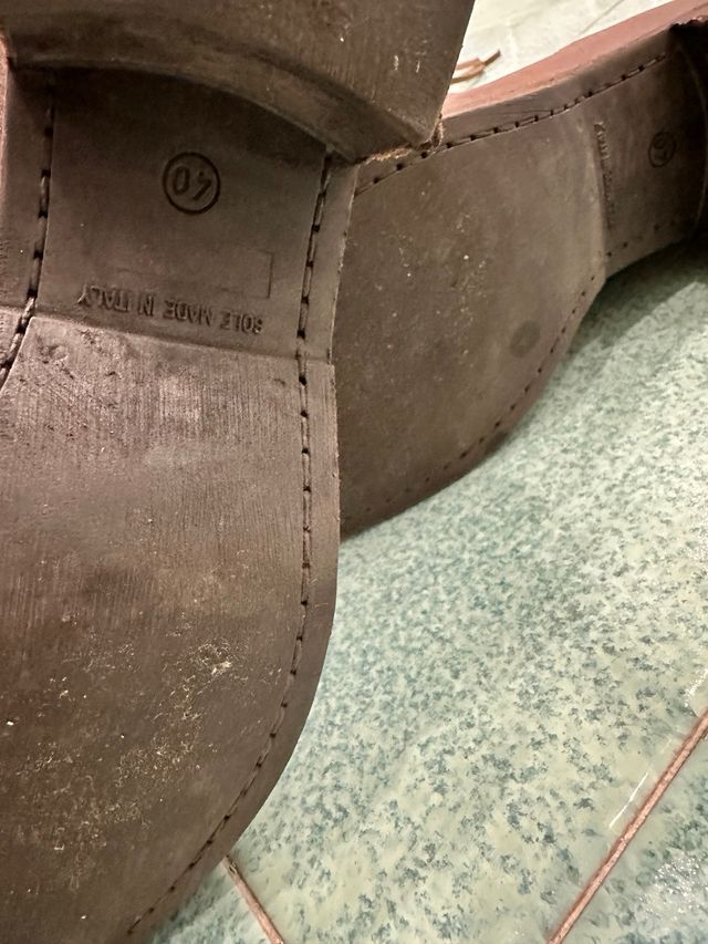 Stivali in pelle marrone con frange