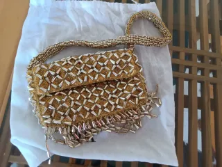 Bolso fiesta Zara abalorios dorado y plata
