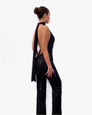 Mono negro lentejuelas y flecos