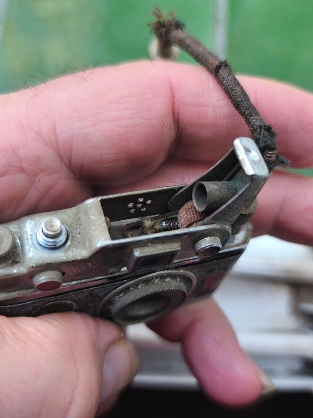 Mechero Cámara miniatura con trípode 