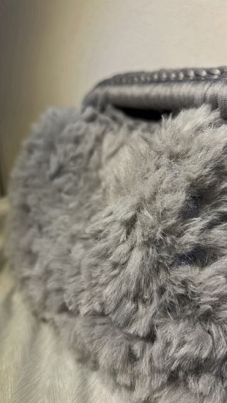 Clutch bag in pelliccia