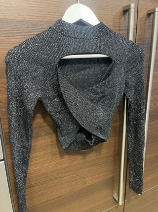 Jersey fiesta brillo manga larga cuello alto