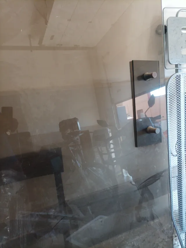 Puerta giratoria de cristal