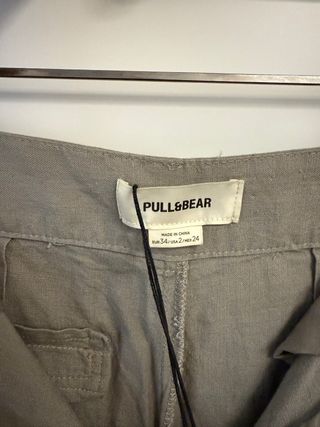 Pantalones de pinzas grises