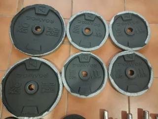 Discos de pesas DOMYOS. Mancuernas rosca y cierres
