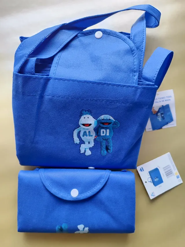 2 Bolsas de compra Al y DI con muñecos